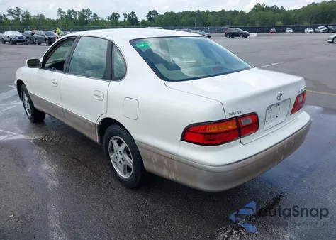 1999 Toyota Avalon Xls z USA, uszkodzony, nr VIN 4T1BF18B8XU335587